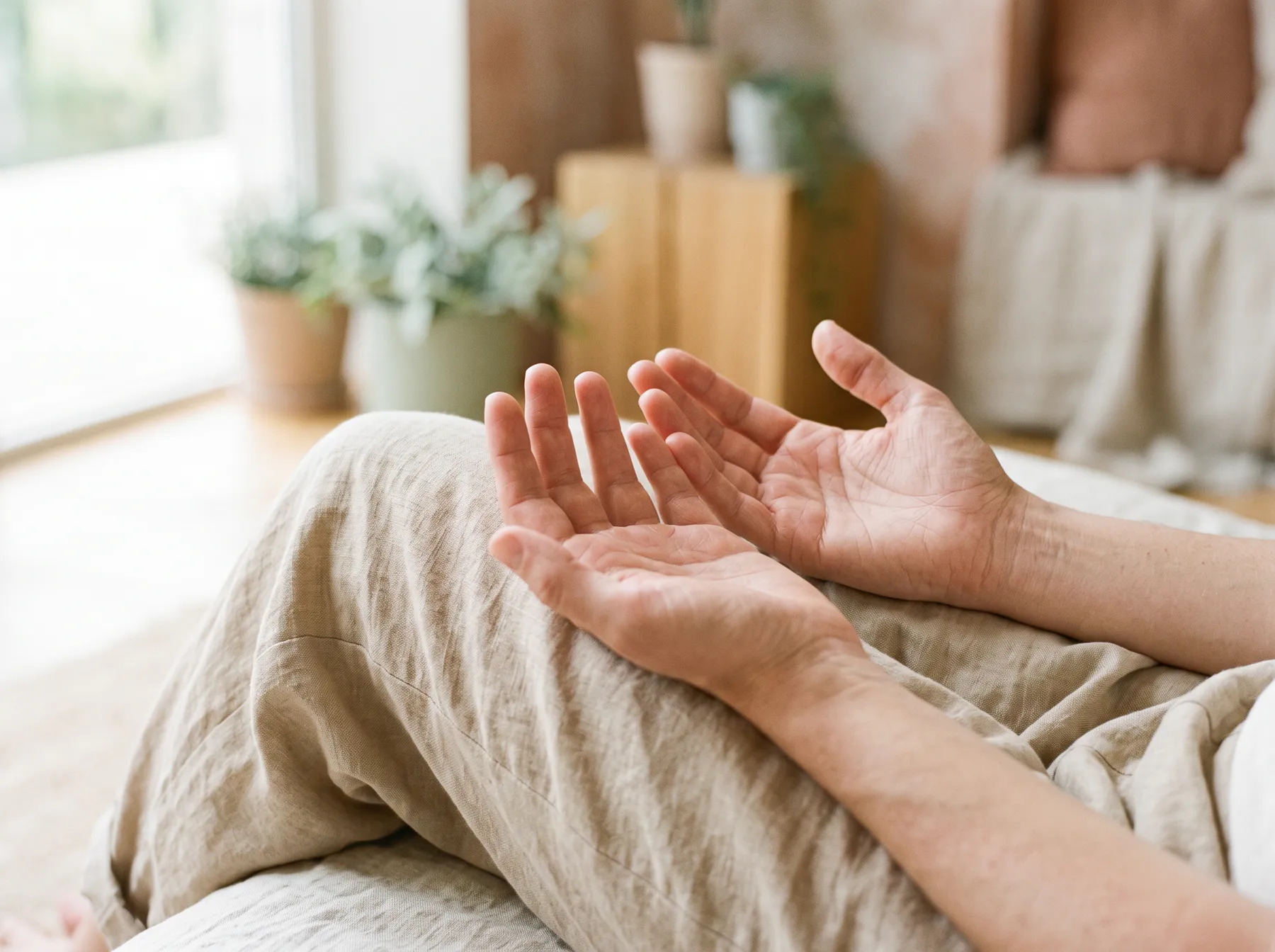 Open hands resting palms up